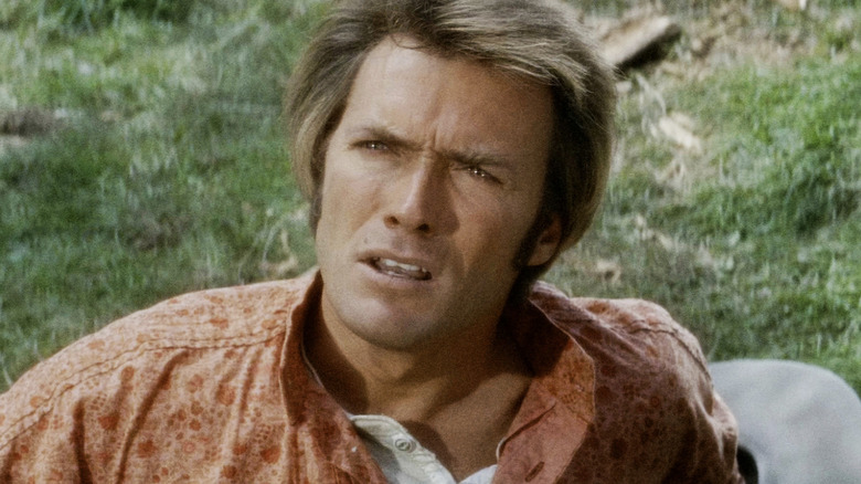 Clint Eastwood's Sylvester Newel looks up as he lies on the ground in Paint Your Wagon