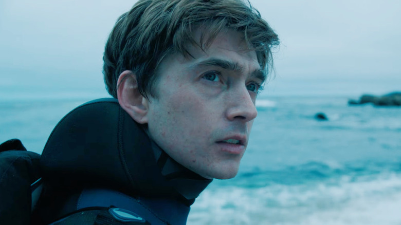 Austin Abrams as Jay Gardiner looking serious in Whalefall