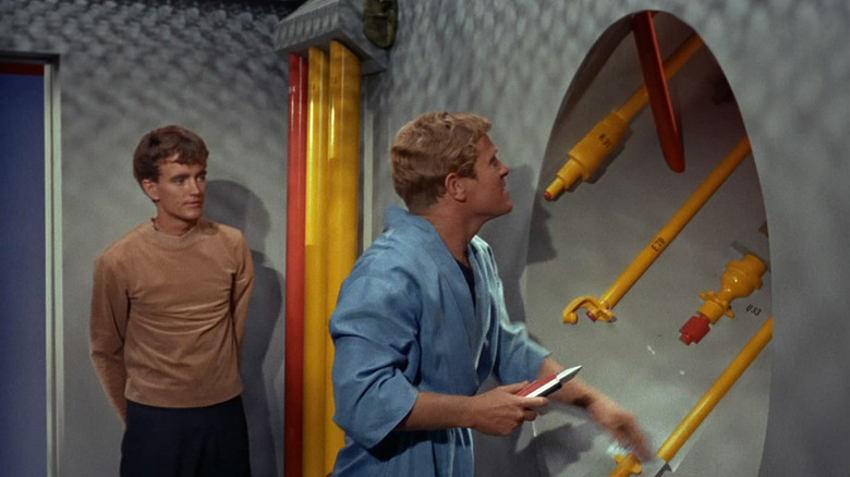 Charlie X and an Enterprise crewmate outside of a Jeffries Tube on Star Trek