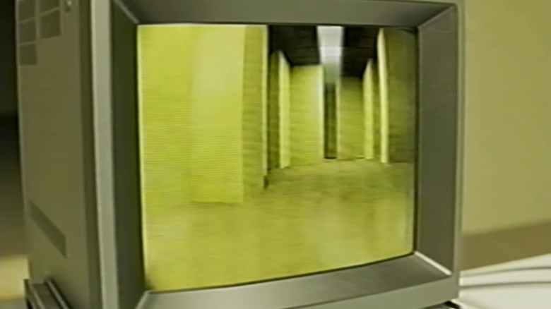 A computer monitor with footage of the Backrooms in the Backrooms - Reunion YouTube short