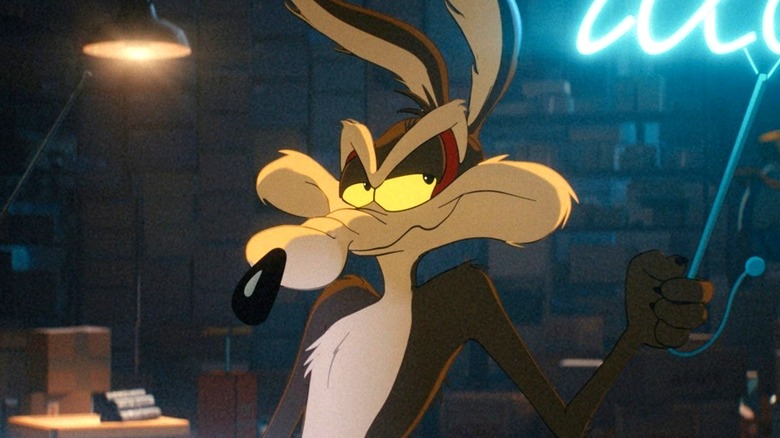 Wile E. Coyote holding an idea sign in Coyote vs. Acme