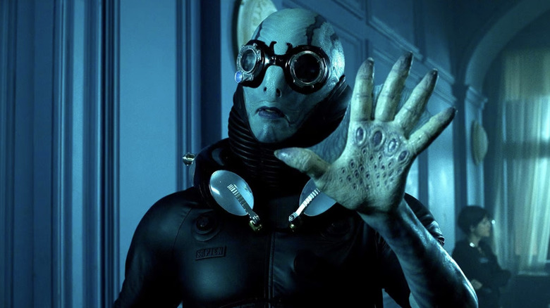 Abe Sapien holding his left hand up in Hellboy II: The Golden Army