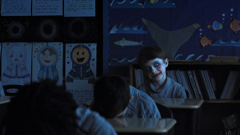Alex Lilly wearing creepy makeup in Weapons