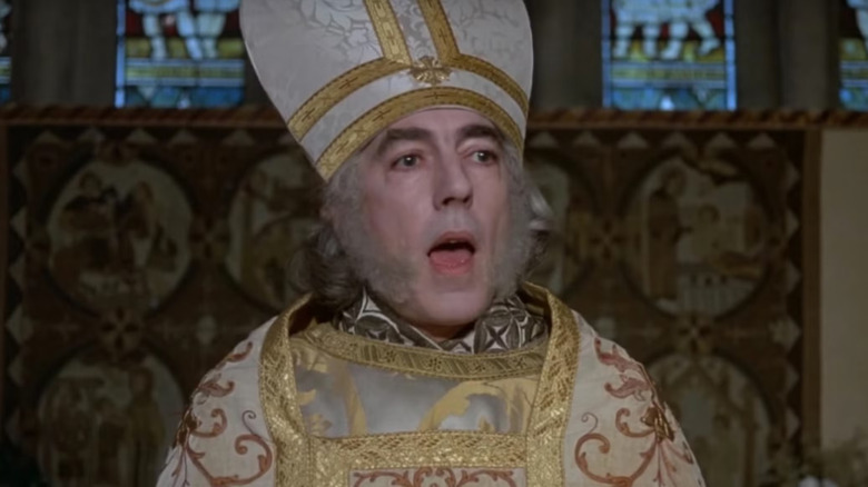 Peter Cook as the clergyman presiding in church in The Princess Bride