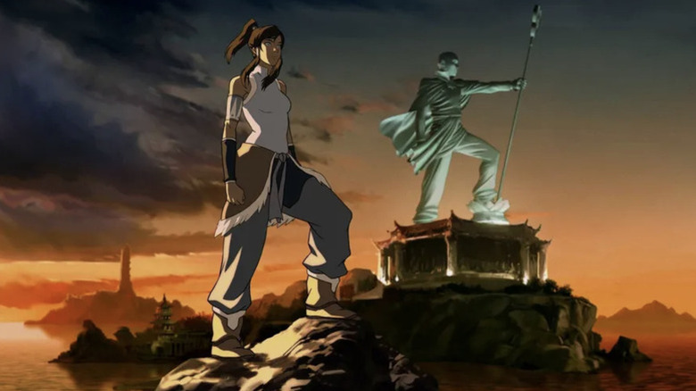 Korra standing in the shadow of a statue of Avatar Aang in The Legend of Korra