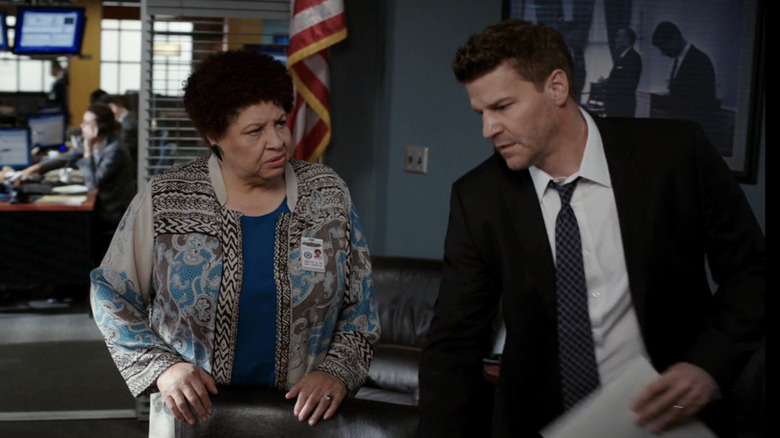 Patricia Belcher's Caroline Julian stands alongside David Borean's Seely Booth in a government office in Bones