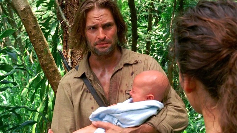 Lost, Sawyer holding Claire's baby Aaron after Claire disappears