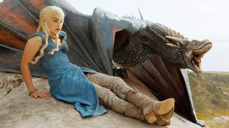 Emilia Clarke as Daenerys Targaryen and her dragon Drogon in Game of Thrones