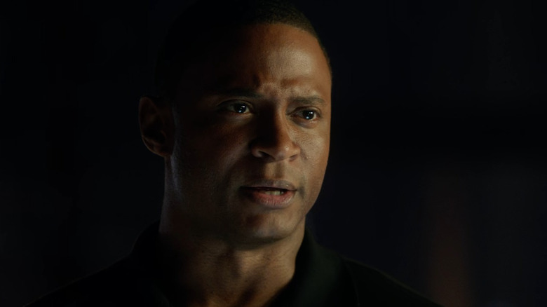 David Ramsey as John Diggle, talking to someone on Arrow