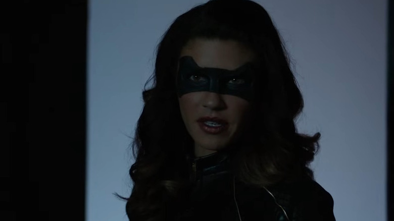 Juliana Harkavy as Black Canary, afraid in a warehouse on Arrow