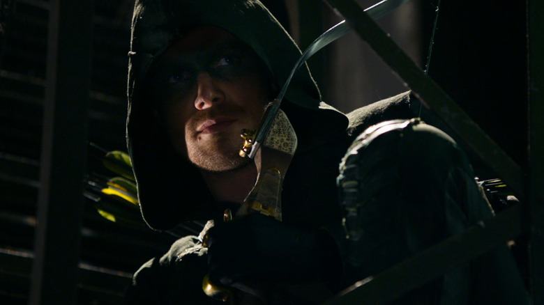 Stephen Amell as Oliver Queen, dressed as Green Arrow on Arrow
