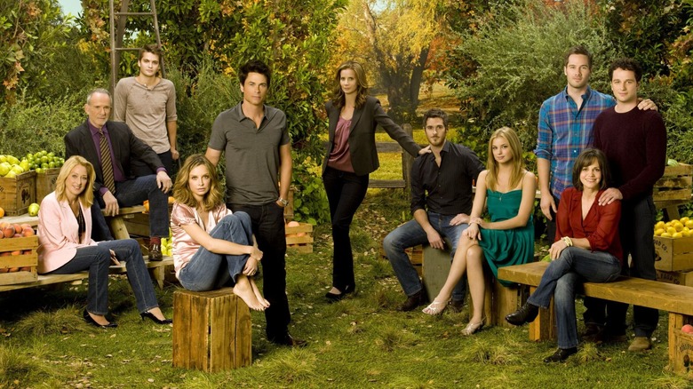 The cast of Brothers & Sisters in an orchard