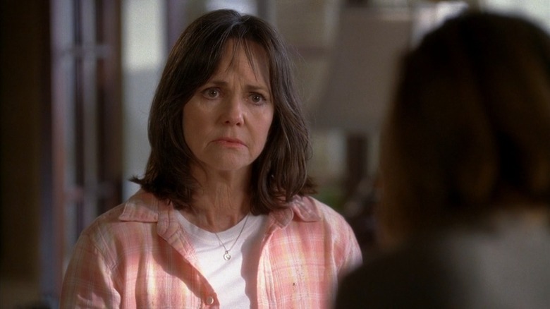 Sally Field as Nora Walker on Brothers & Sisters, looking concerned in a pink shirt