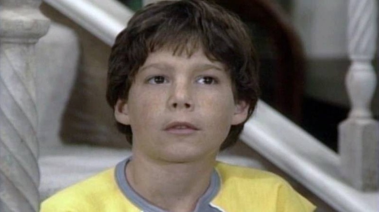 Jason Pembroke (Michael Pearlman) sitting on a stoop on Charles in Charge