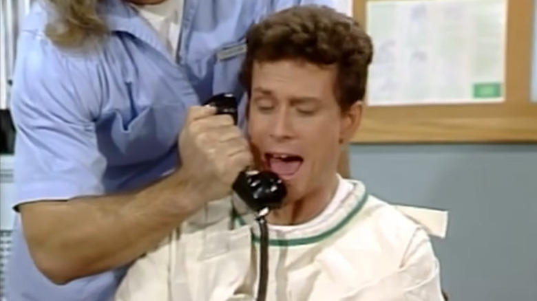 Buddy (Willie Aames) screaming into telephone on Charles in Charge