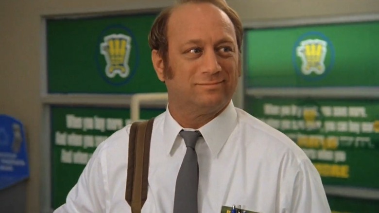 Scott Krinsky as Jeff on Chuck, in his Buy More uniform, walking into the store