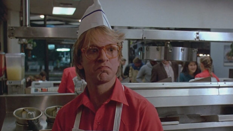 Scott Thomson as Arnold looking dissatisfied in Fast Times at Ridgemont High