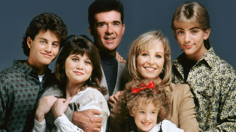 Seaver family from Growing Pains posing