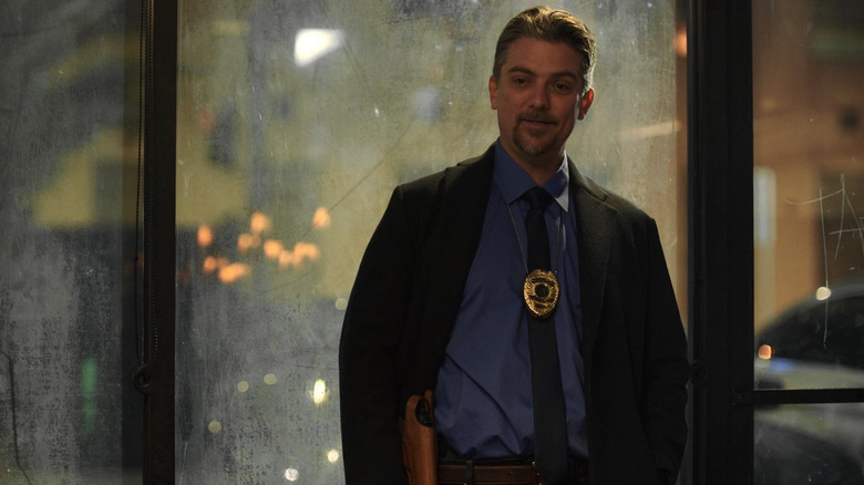 Detective Holt (Jeremy Miller) on call in Angel