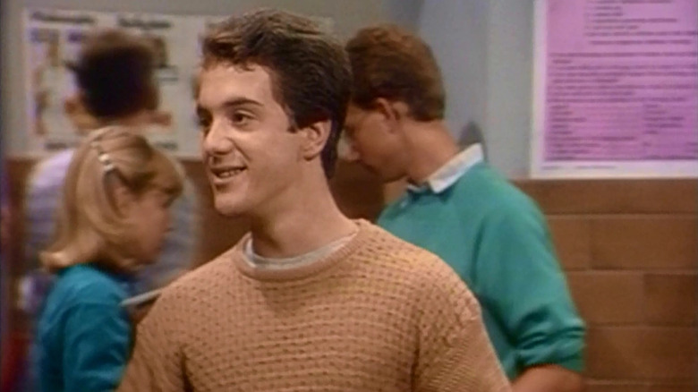 Eddie (K.C. Martel) in school hallway in Growing Pains