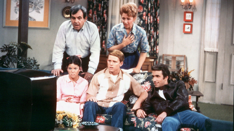 The Cunninghams and the Fonz reacting to TV in Happy Days