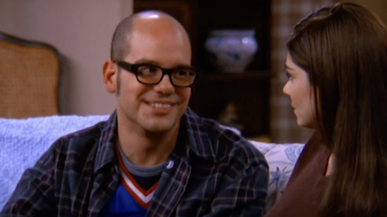 David Cross as Donnie smiling at Laura San Giacomo as Maya in Just Shoot Me!