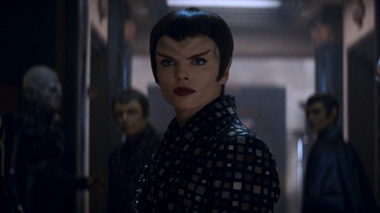 Dina Meyer as Commander Donatra in Star Trek: Nemesis, looking back before leaving the room