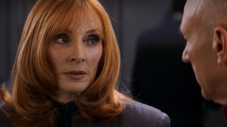 Gates McFadden as Dr. Beverly Crusher talking to Picard in Star Trek: Nemesis