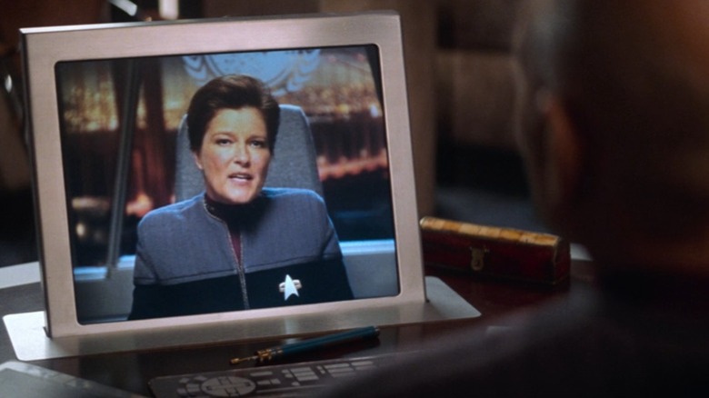 Kate Mulgrew as Admiral Janeway talking to Picard over a video screen in Star Trek: Nemesis
