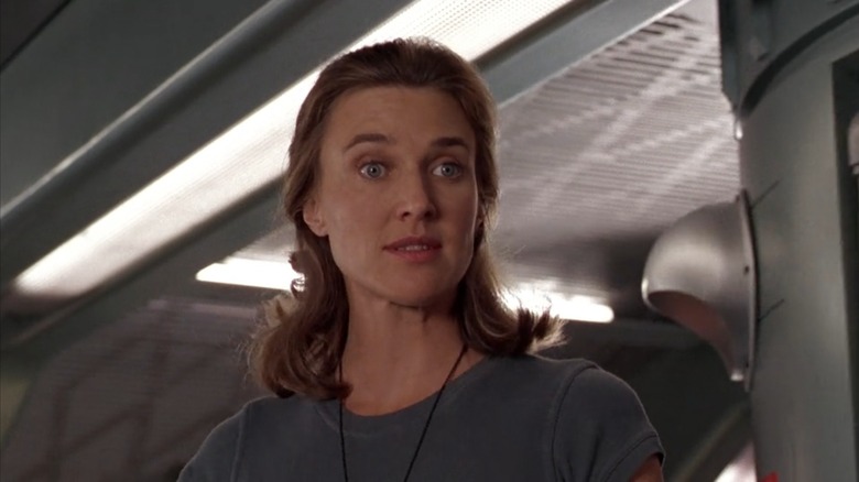 Brenda Strong as Captain Deladier in Starship Troopers, at her command post