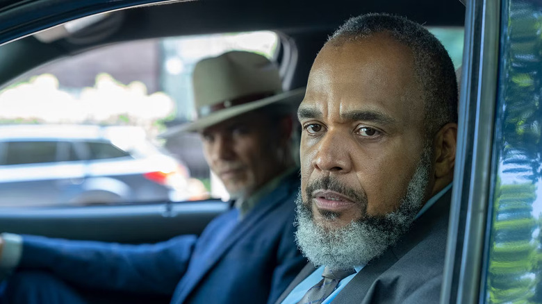Raylan Givens (Timothy Olyphant) and Wendell Robinson (Victor Williams) perform a stakeout in Justified City Primeval