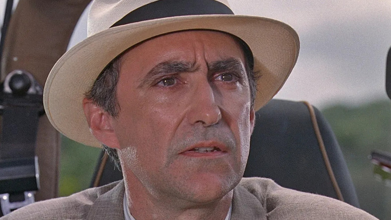 Martin Ferrero as Donald Gennaro, looking concerned in Jurassic Park