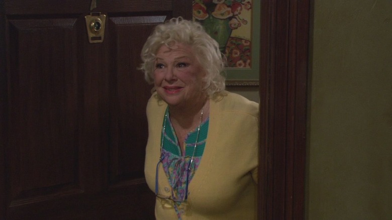 Mrs. Matsen (Renee Taylor) snoops from her apartment in How I Met Your Mother