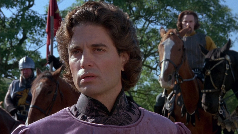 Chris Sarandon as Prince Humperdinck standing in front of horsemen in The Princess Bride