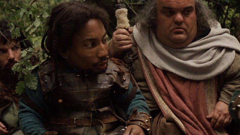 Tony Cox as a Nelwyn warrior accompanies pompous leader Mark Northover in Willow