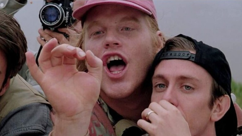Philip Seymour Hoffman as Dusty in Twister, talking with his hands