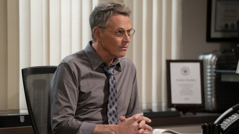 Tim Daly as Agent Andrew doesn't know quite what to make of Leanne, on Netflix's Leanne