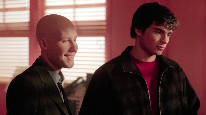 Michael Rosenbaum's Lex Luthor smiling with Tom Welling's Clark Kent in the Smallville episode Kinetic