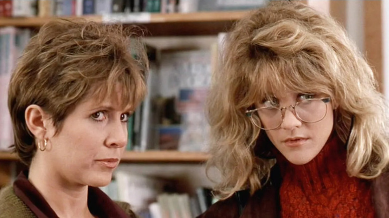 Marie and Sally look skeptically off screen in a bookstore in "When Harry Met Sally..."