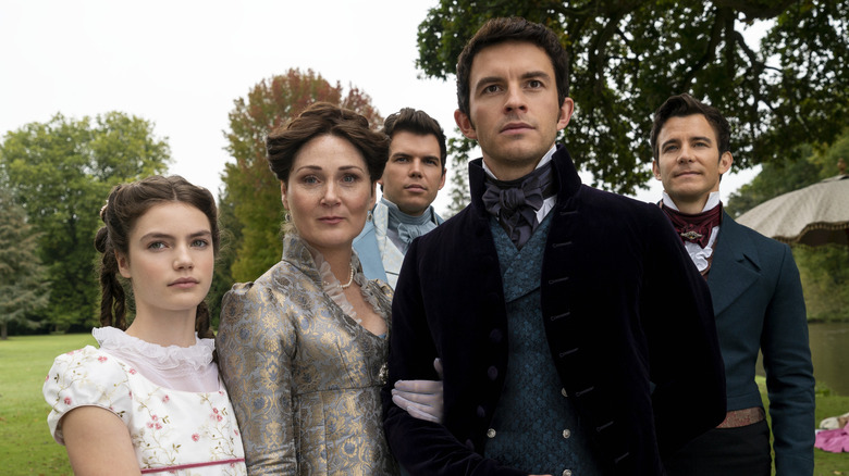 Anthony stands with the Bridgerton family in Bridorrgetton Season 2