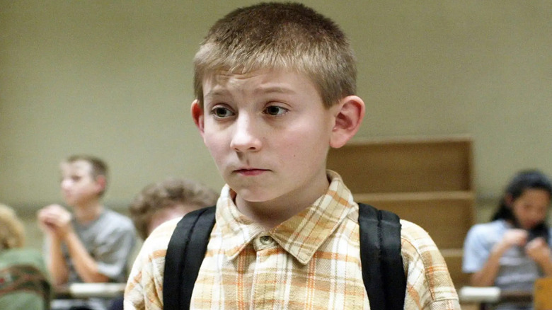 Erik Per Sullivan as Dewey walking through school on Malcolm in the Middle