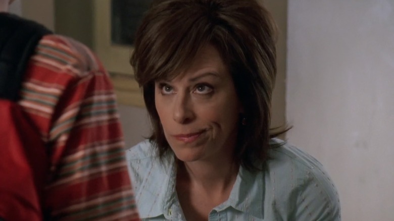 Jane Kaczmarek as Lois smirking on Malcolm in the Middle