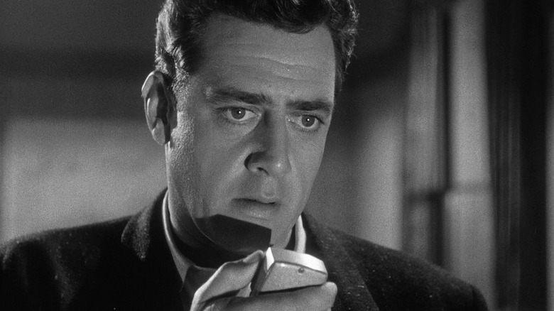 Raymond Burr as Steve Martin speaking into his recorder in Godzilla, King of the Monsters! (1956)