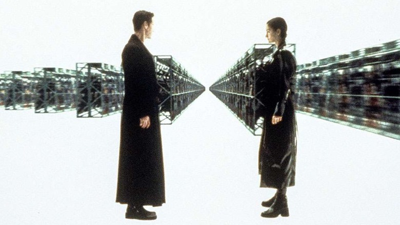 Neo and Trinity stand inside a Construct (which draws from Gibson's cyberspace) in The Matrix