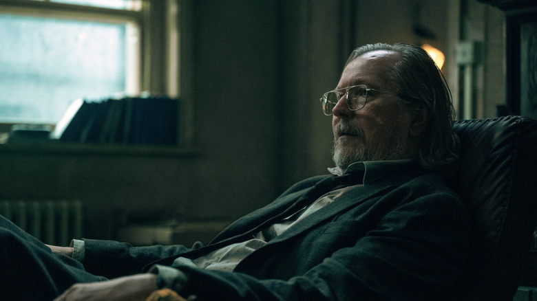 Gary Oldman's Jackson Lamb reclines in his office in Slow Horses