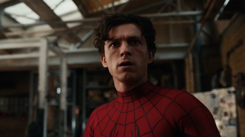 Tom Holland as Spider-Man with his mask off in his apartment in Spider-Man: Brand New Day
