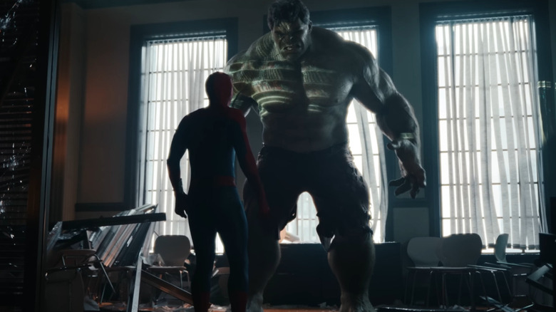 Tom Holland as Spider-Man staring up at Savage Hulk in Spider-Man: Brand New Day