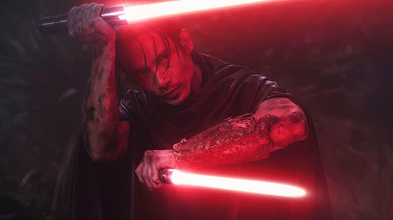 Qimir holds his lightsabers while exposing his armored armguards in The Acolyte