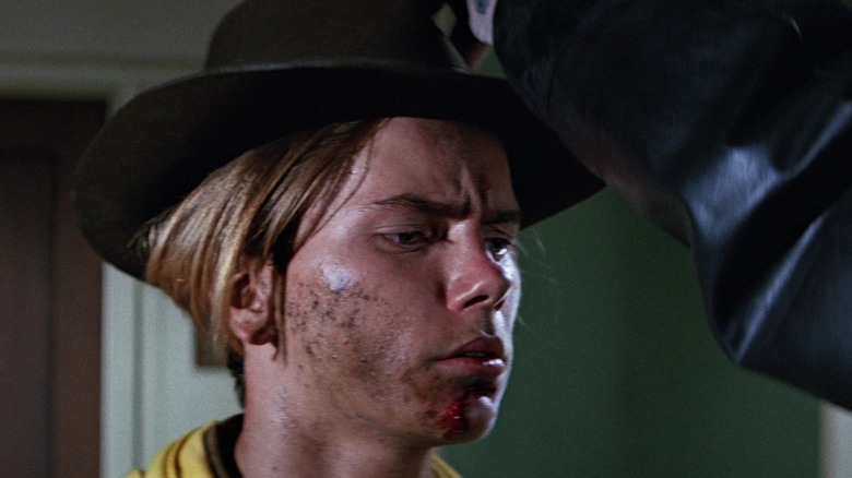 Young Indiana Jones gettng a hat put on his head in Indiana Jones and the Last Crusade