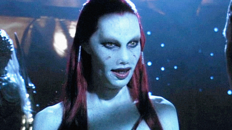 Ande Frzzell Wraith is looking at someone outside the screen at Stargate Atlantis